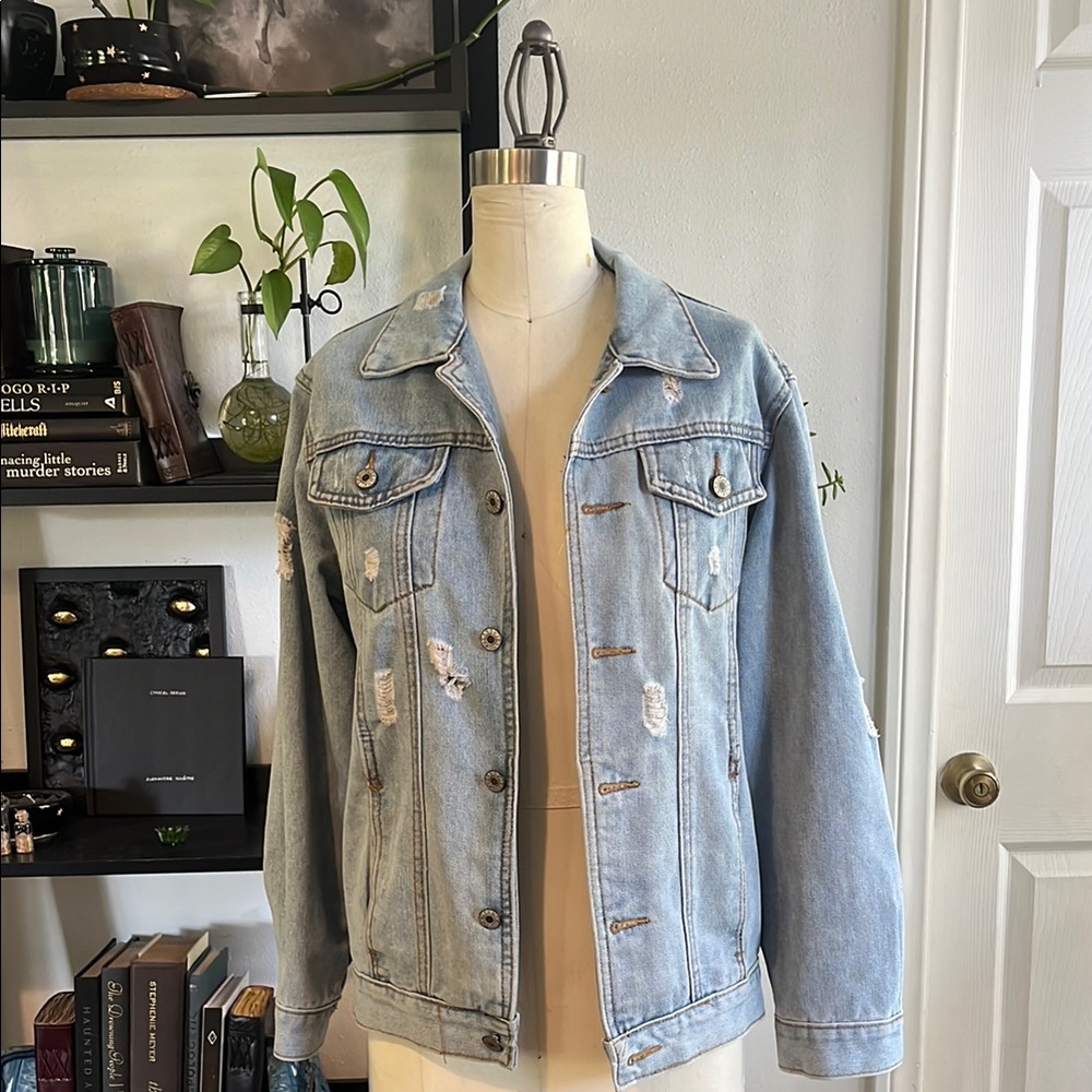 D. S studio Women's Blue Denim Jacket with distressing and custom black crescent